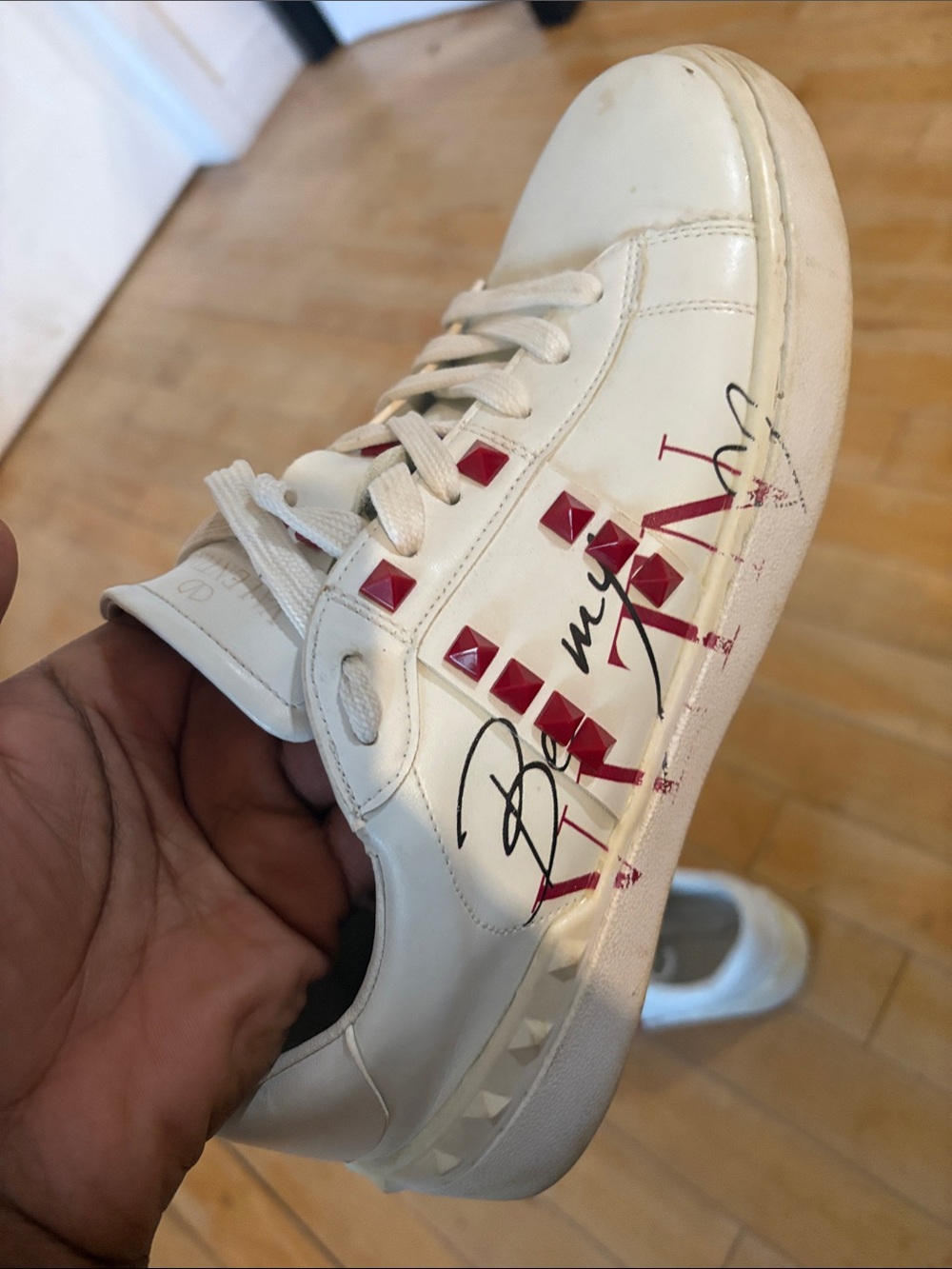 Valentino White Leather Low-Top Sneakers with Red Pyramid Studs